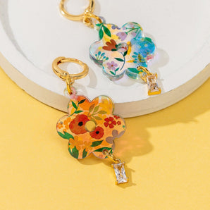 18K Gold-plated Huggie Earrings with iridescent summer flowers and a hanging gemstone
