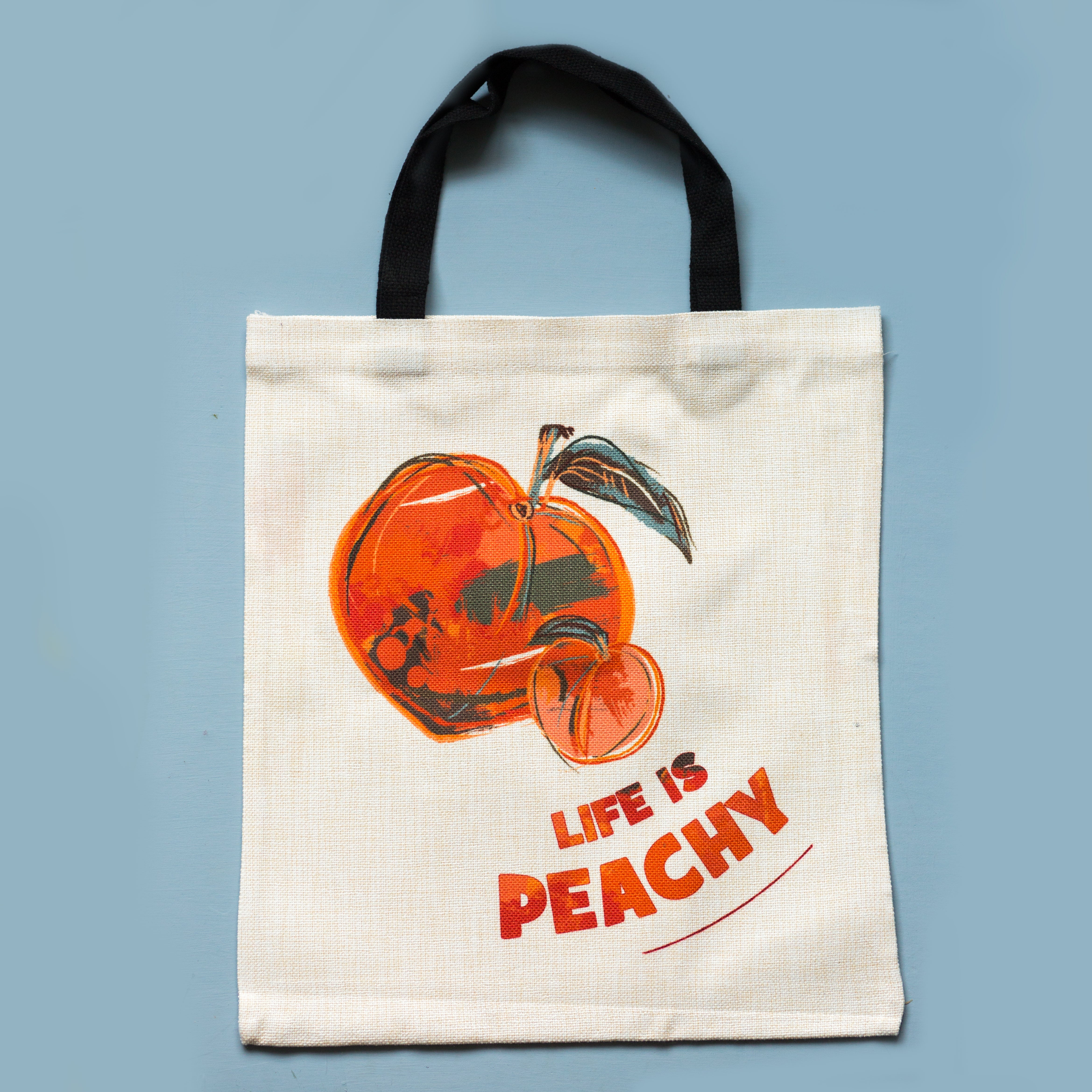 Life is peachy tote bag flat lay