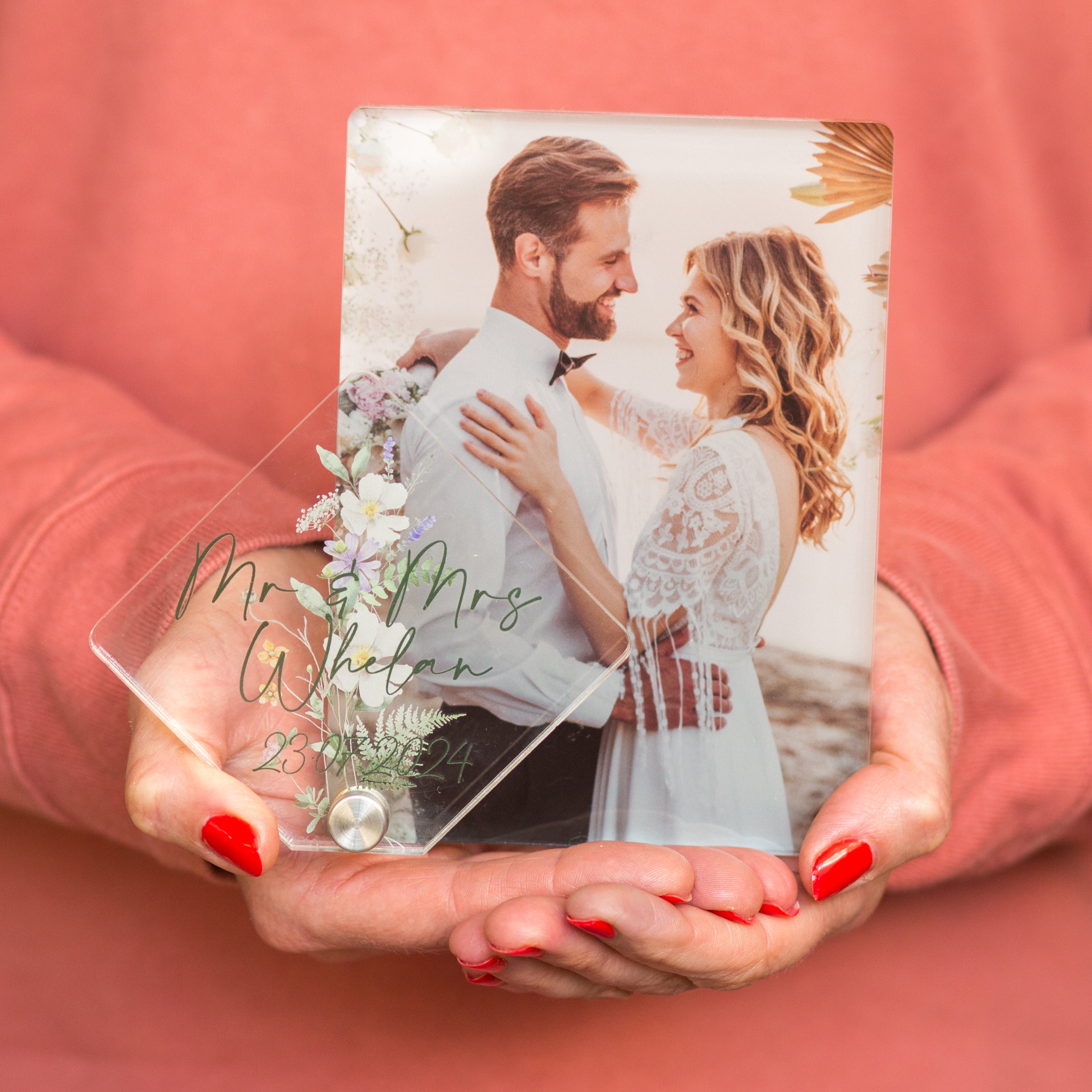 woman holding acrylic wedding photo block