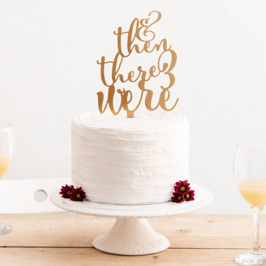 https://giftingknot.com/cdn/shop/products/original_then-there-were-three-baby-announcement-cake-topper-set.jpg?v=1670182977
